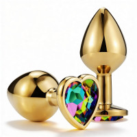 ALUME | Анальная пробка ALUME, M, металлическая золотистая с разноцветным камнем в форме сердца, 8,5х3,3 см. Цена: 496 грн